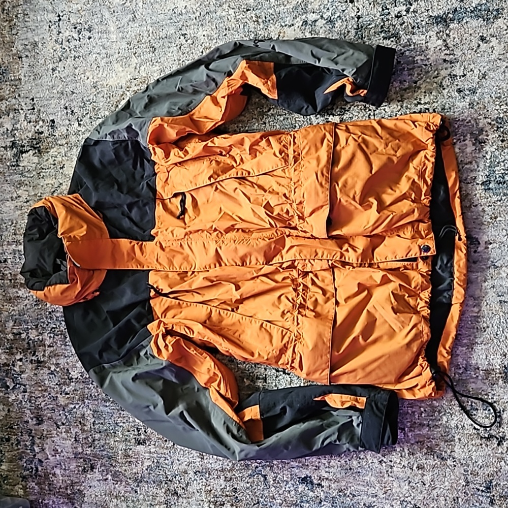 North Face orange and grey jacket